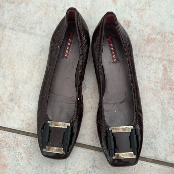 Prada Brown Flats with Silver Accents - Picture 1 of 9